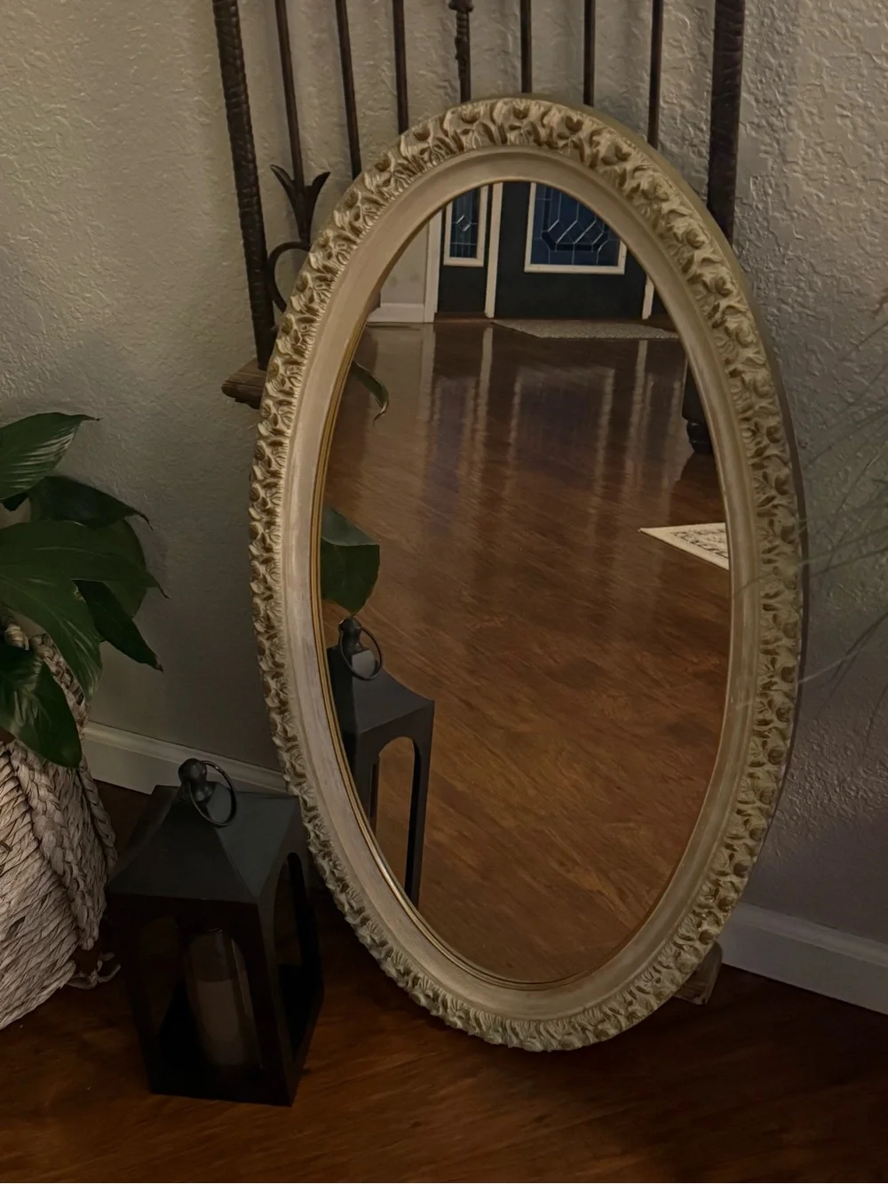 Vintage Oval Wall Mirror Featuring An Ornate, Off-White And Gold-Accented Frame